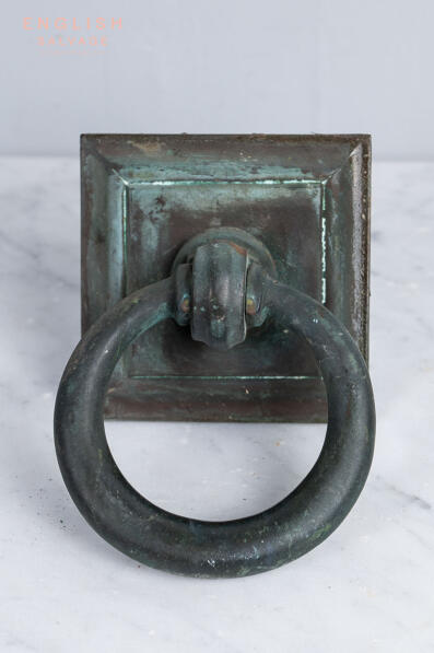 A round bronze centre door pull