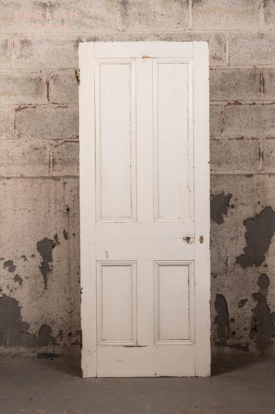 A salvaged four panel pine door