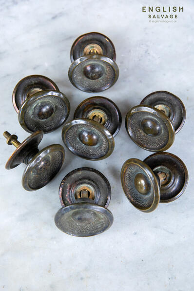 A set of reclaimed bronze cabinet knobs