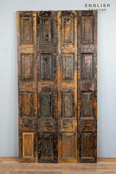 A set of reclaimed teak shutters or dividers