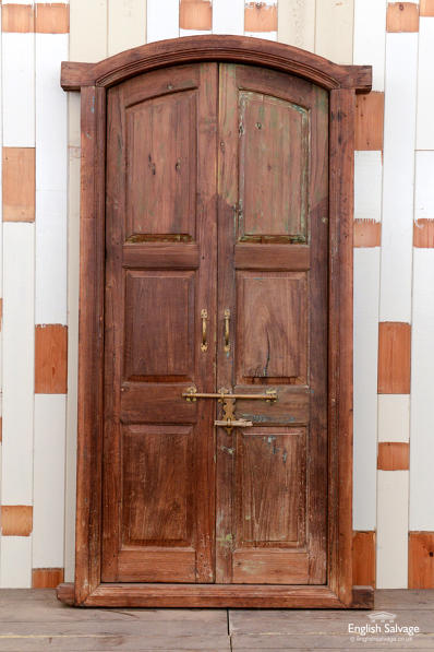 Anglo-Indian teak arch top doors in frame 