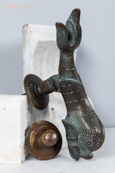 Antique bronze dolphin door knocker