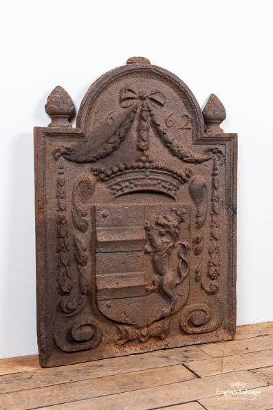 Antique cast iron fireback and dogs