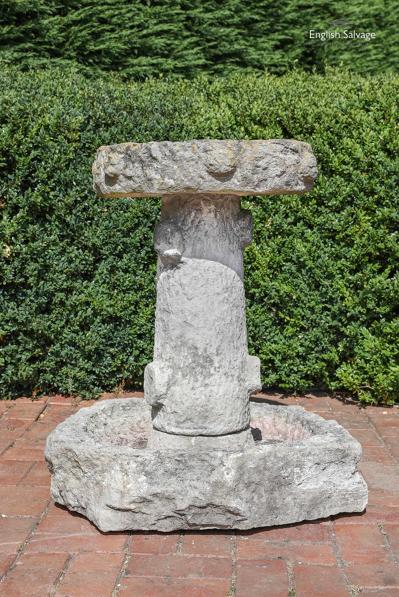 Antique limestone tree form birdbath