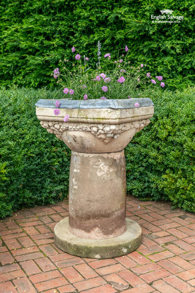 Antique stone font planter