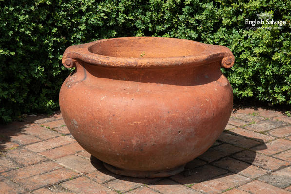 Antique terracotta scroll handle pot 