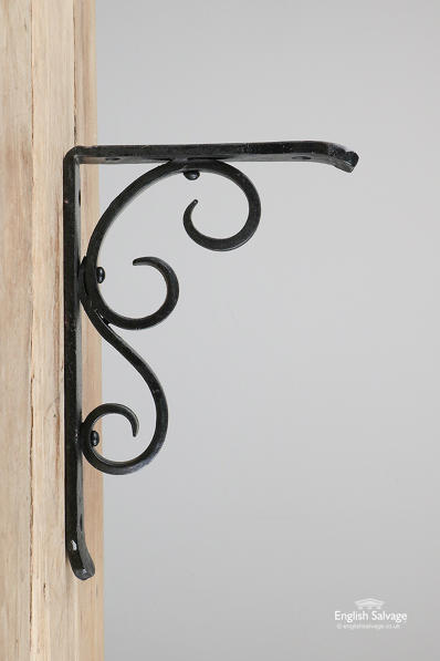Black scrollwork shelf brackets