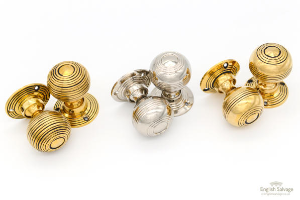 Brass and nickel banded / ringed door knobs