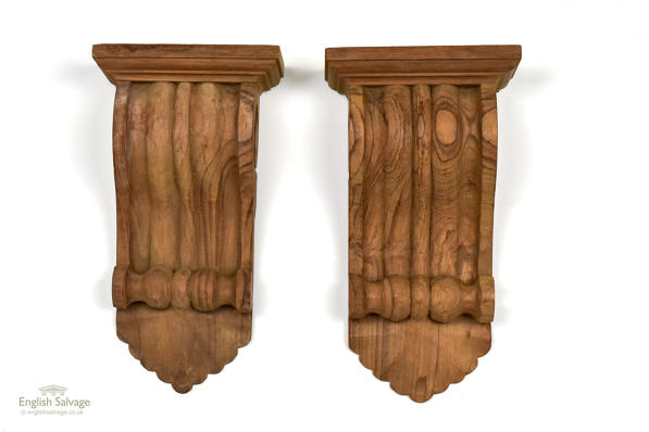 Carved hardwood scroll corbels with fans