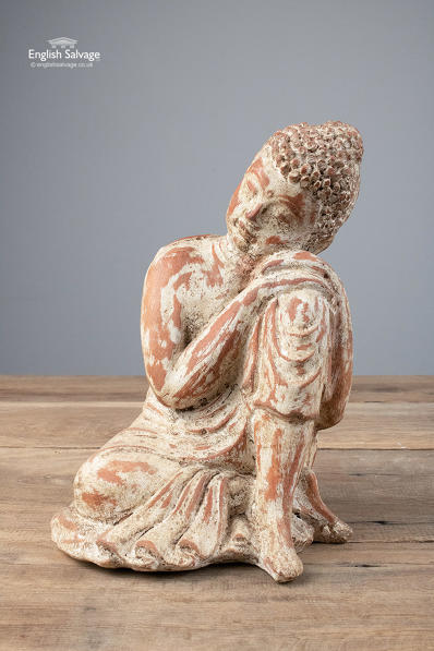 Carved red clay seated Buddha statues