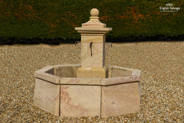Carved sandstone fountain and pond surround