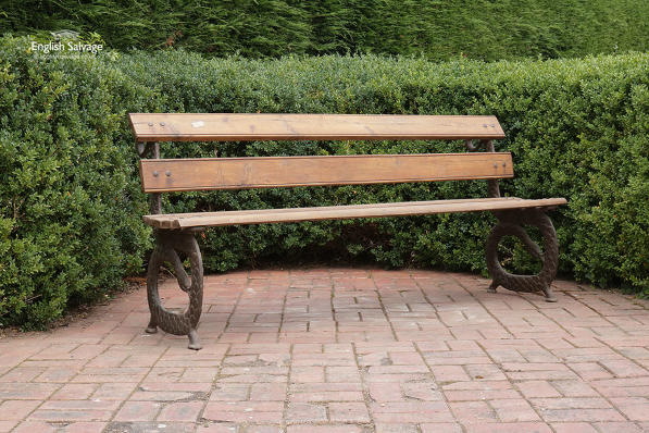 Cast iron and reclaimed teak serpent bench