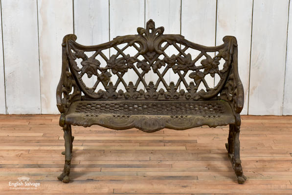 Cast iron garden bench with scrolling design