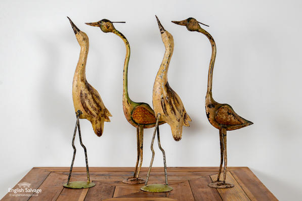 Characterful Indian painted iron bird statues