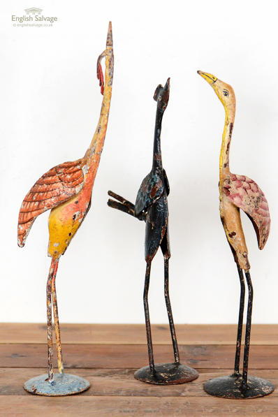 Colourful hand painted metal bird statues