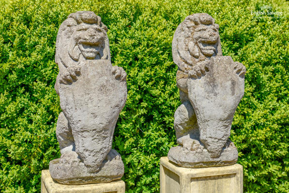 Composition stone armorial lions with shield