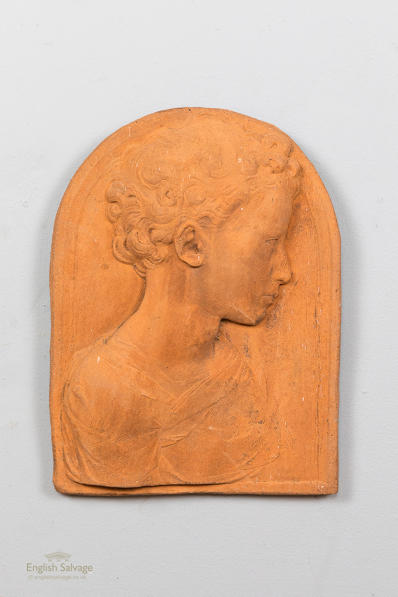 Decorative wall plaque of young boy