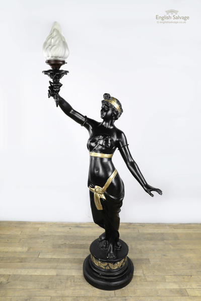 Early 20C Lady holding torch black gold lamp