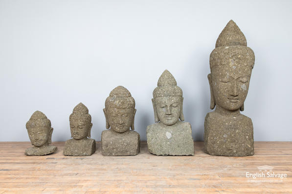 Hand-carved stone Buddha busts