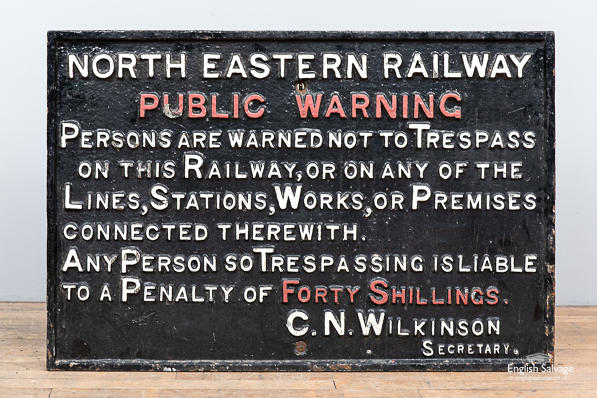 Heavy cast iron railway sign