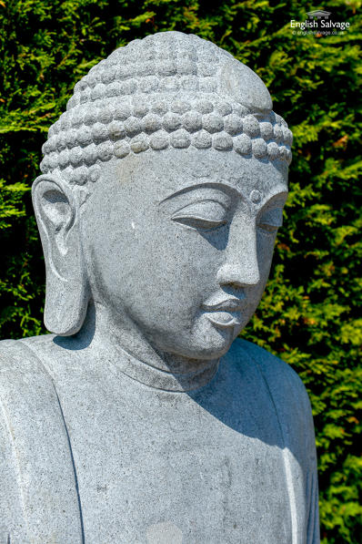 Huge hand-carved stone meditating Buddha 