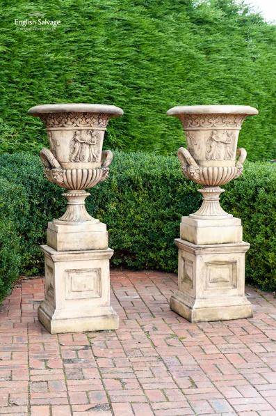 Imposing pair of classical urns on plinths