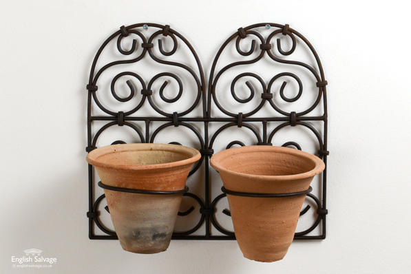 Iron scrollwork double wall planter with pots