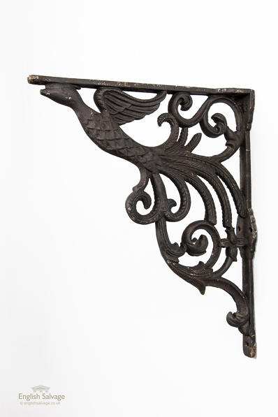 Large cast iron bracket with peacock