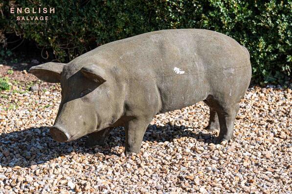 Large old composition stone pig figure