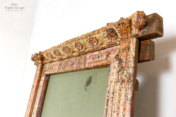 Large ornately carved mirror or door frame