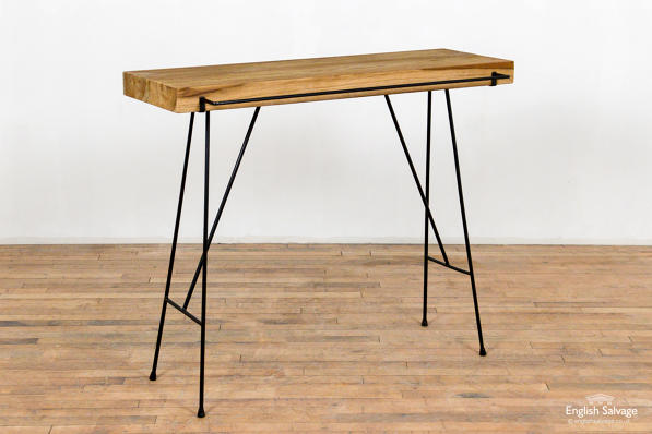 Minimalist console table with hanging rail 