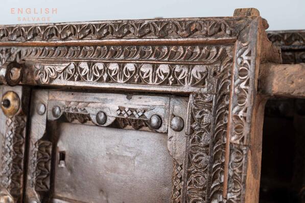 Original carved wood and metal studded doors