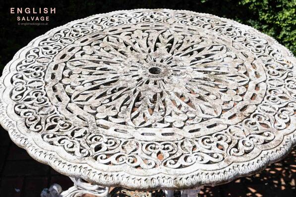 Ornate reclaimed alloy table