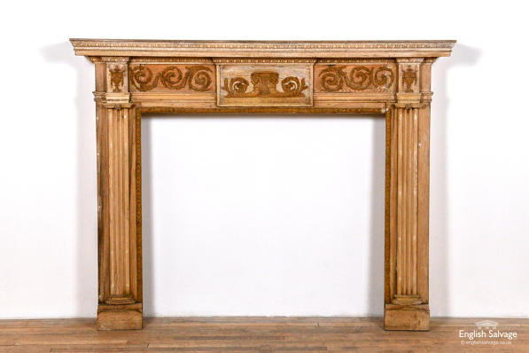 Ornately carved scroll wooden fire surround 