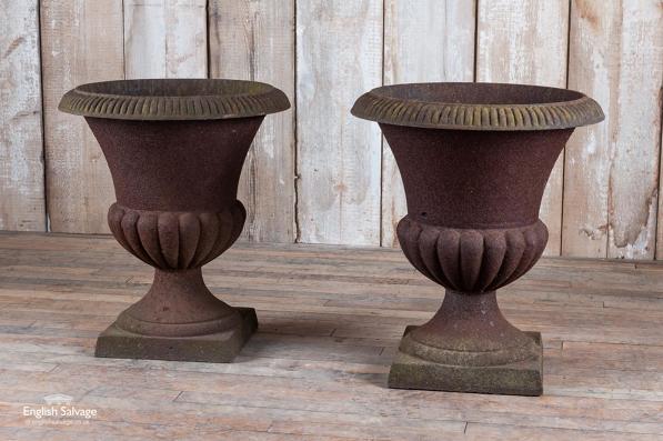 Pair of cast iron fluted garden urns