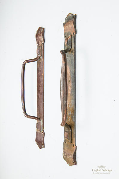 Pair of period bronze door pulls
