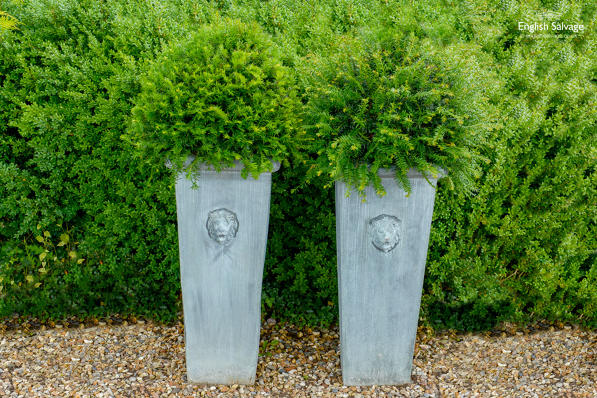 Pair of zinc coated lion motif planters 
