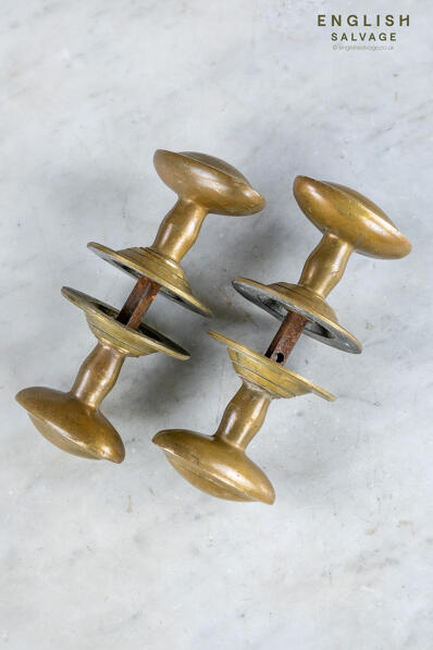 Period oval brass door knobs