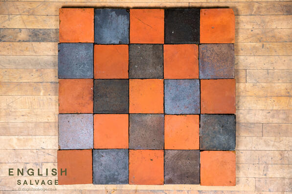 Reclaimed red and black quarry floor tiles