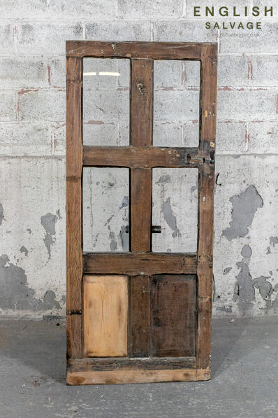 Reclaimed six panel door with glazed panels