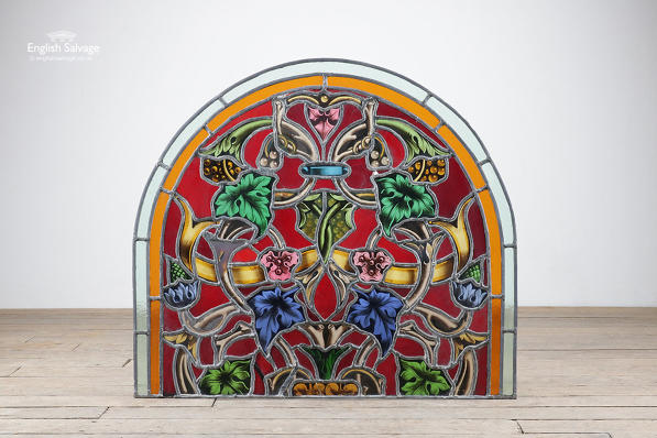 Reclaimed stained glass arched panel