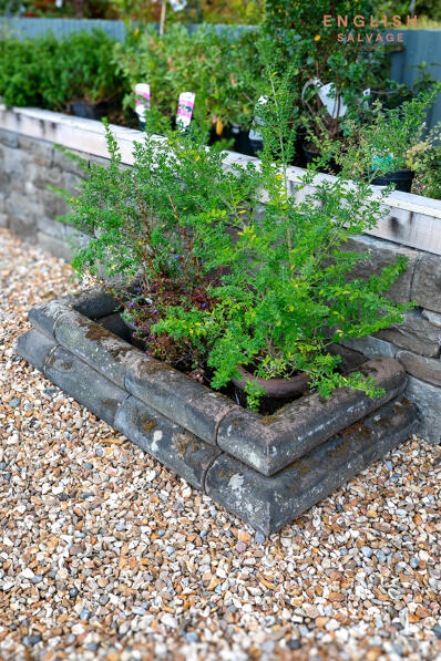 Reclaimed stone raised bed