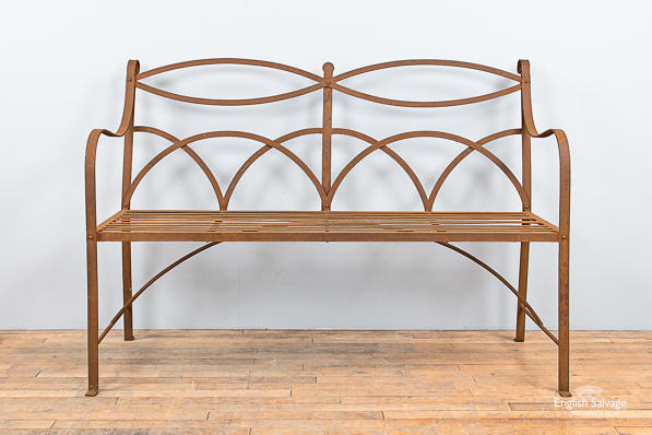 Rusty regency style wrought iron bench