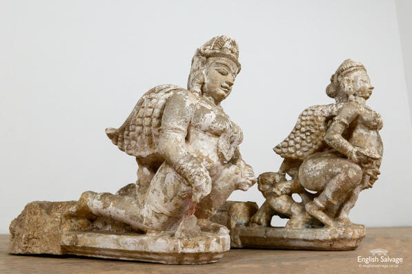 Salvaged antique carved stone deities
