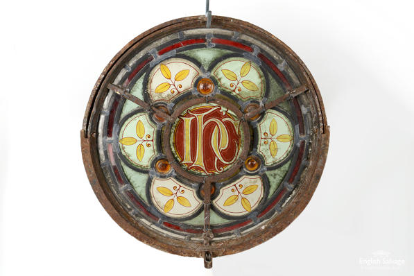 Salvaged antique round stained glass window