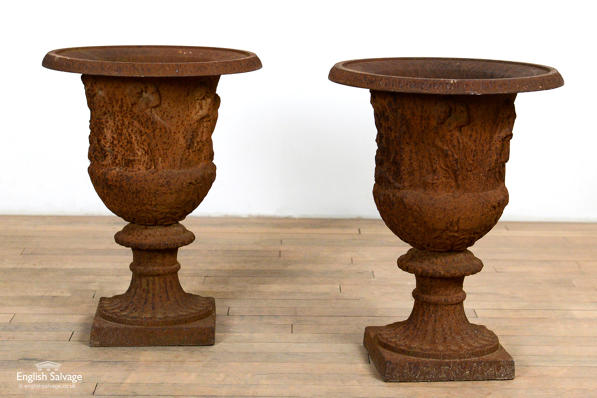 Salvaged cast iron campana urns