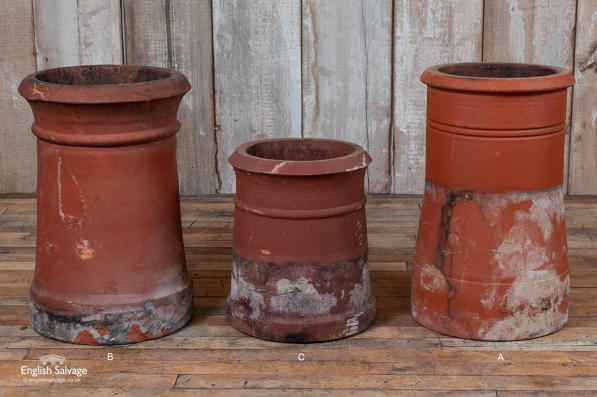 Salvaged terracotta round chimney pots