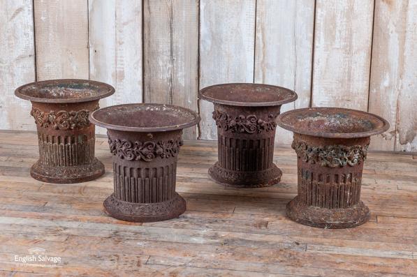 Set of four C19th cast iron garden urns