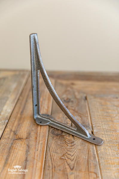 Simple cast iron unpainted shelf brackets