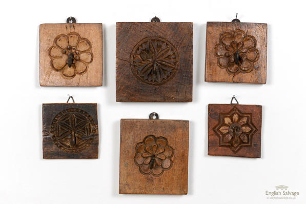 Single key hooks on wooden flower boards
